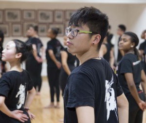 Camille's partner, Jason, participating in a dance class with AADC.
