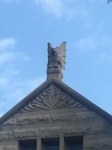 This gargoyle perches on top of Maxwell Hall.