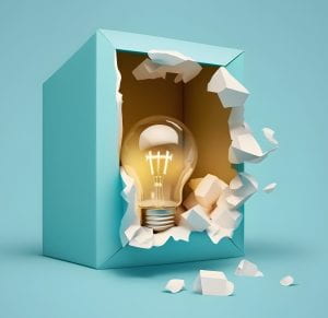 Image of an exploding box with a light bulb inside.