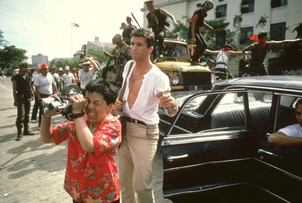 Title: YEAR OF LIVING DANGEROUSLY, THE ¥ Pers: HUNT, LINDA / GIBSON, MEL ¥ Year: 1983 ¥ Dir: WEIR, PETER ¥ Ref: YEA001BT ¥ Credit: [ MGM/UA / THE KOBAL COLLECTION ]