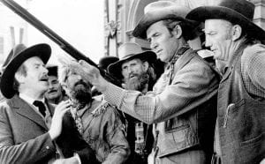James Stewart admires a rifle in WINCHESTER '73