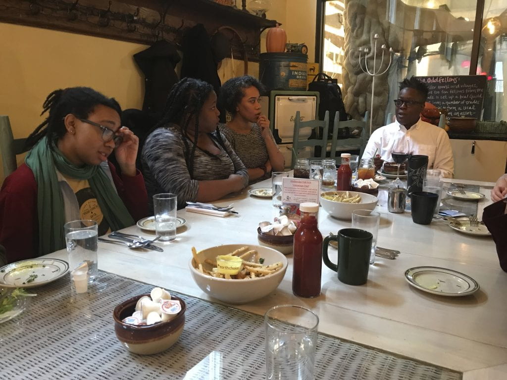 Noni (far left) at lunch with guest filmmaker Cheryl Dunye (far right)