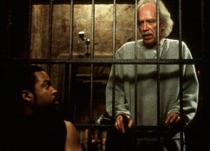 Warden John Carpenter on the set of Ghosts of Mars overseeing inmate Ice Cube