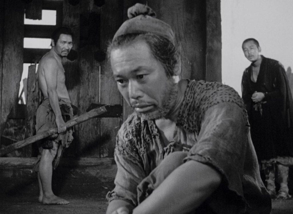 The Priest (Minoru Chiaki), The Woodcutter (Takashi Shimura), and The Commoner (Kichijiro Ueda).
