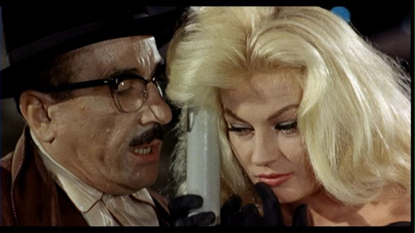Peppino De Filippo and Anita Ekberg in The Temptation of Doctor Antonio (1962).