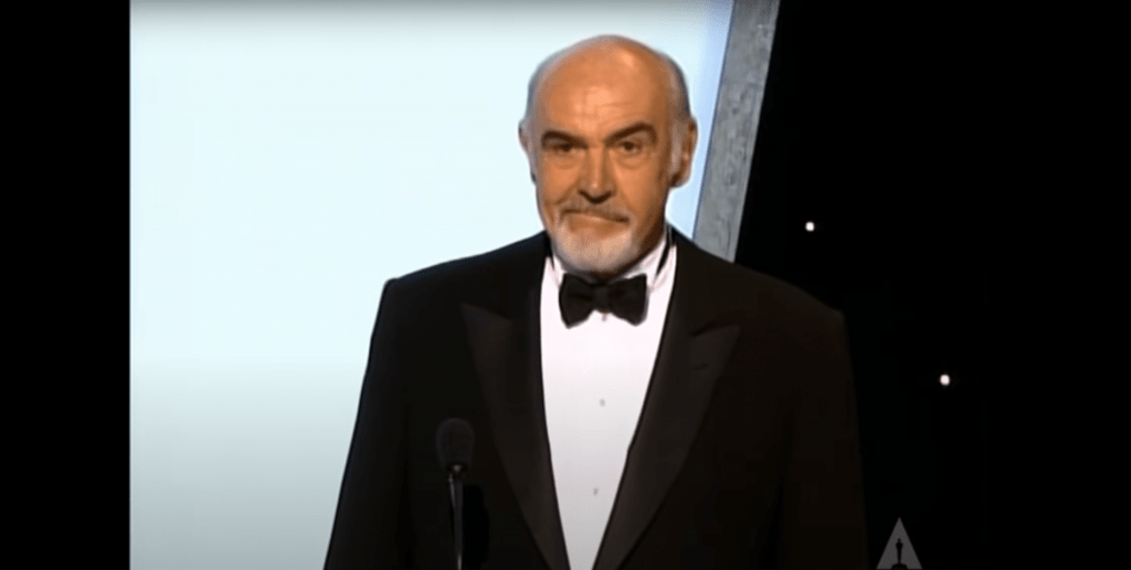Sean Connery grimacing at an awards show