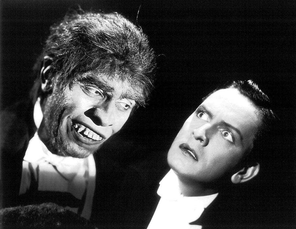 Fredric March as Mr. Hyde (left) and Dr. Jekyll (right) in the 1931 film version.