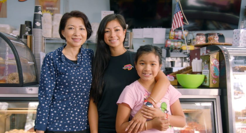 Chuong Lee Tao (left) with daughter Mayly (center) at their shop, DK's Donuts, in Santa Monica