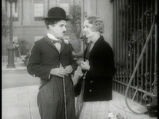 Chaplin (left) and Virginia Cherrill (right) in City Lights (1931), which receives extensive treatment in the documentary