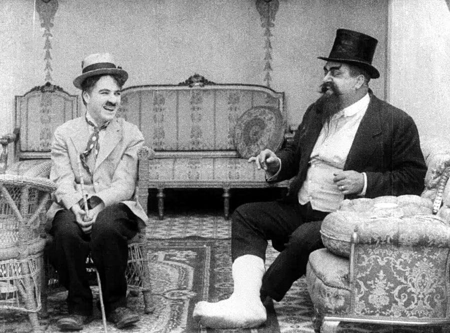 Chaplin (left) and Eric Campbell (right) in The Cure (1917)