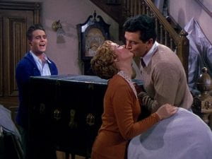 Rock Hudson and Piper Laurie kissing
