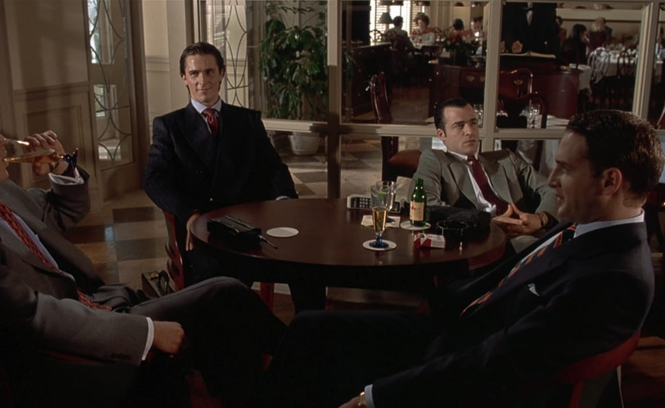 Men in suits sitting around a table