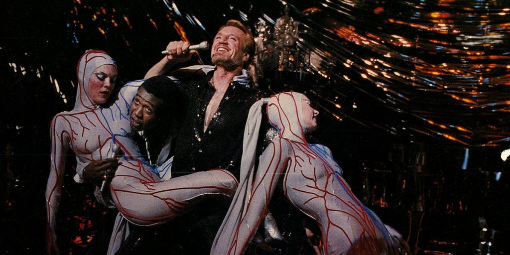 Roy Scheider and Ben Vereen dance with chorus girls in the film ALL THAT JAZZ