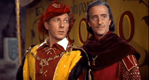 Danny Kaye and Basil Rathbone stand side by side in medieval garb