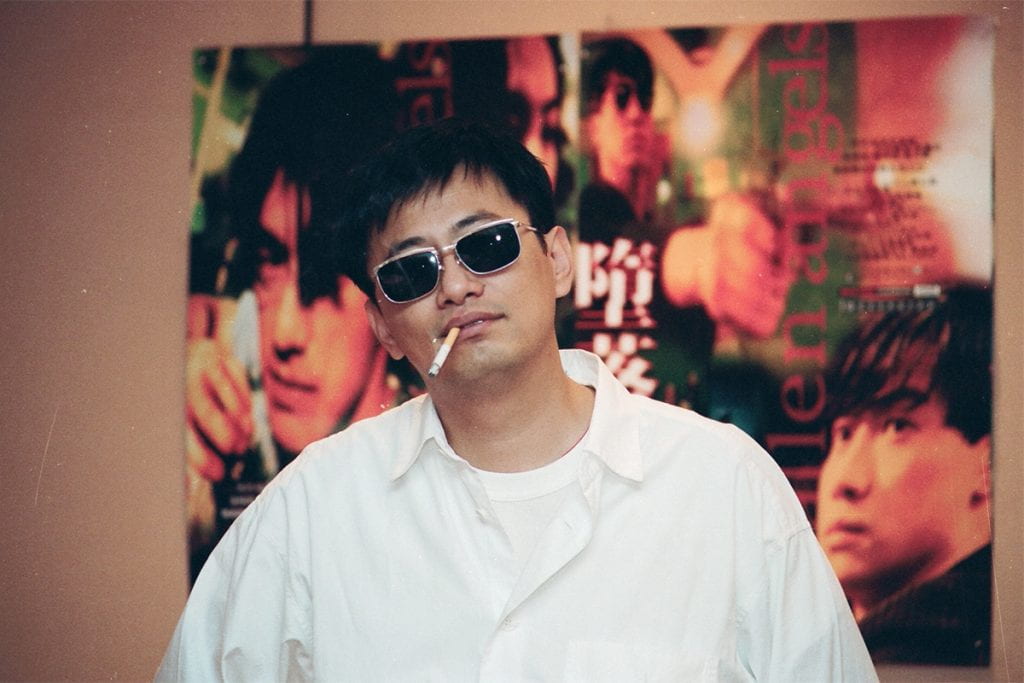 Wong Kar-Wai in sunglasses with a cigarette in his mouth