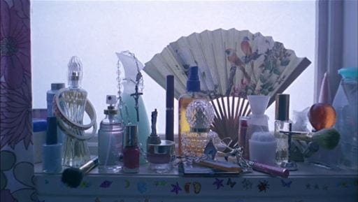 Various feminine Items and products on a windowsill