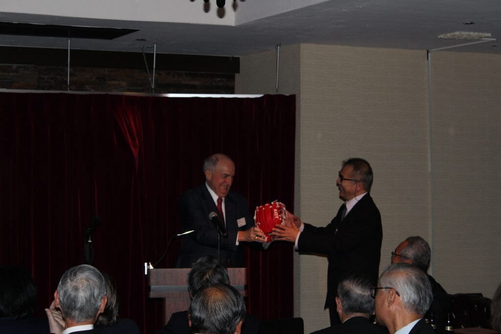 To commemorate the IU baseball team’s 1922 trip to Japan, President McRobbie presents an authentic IU baseball glove to Shinoda Toru, dean of the Center for International Education at Waseda University.