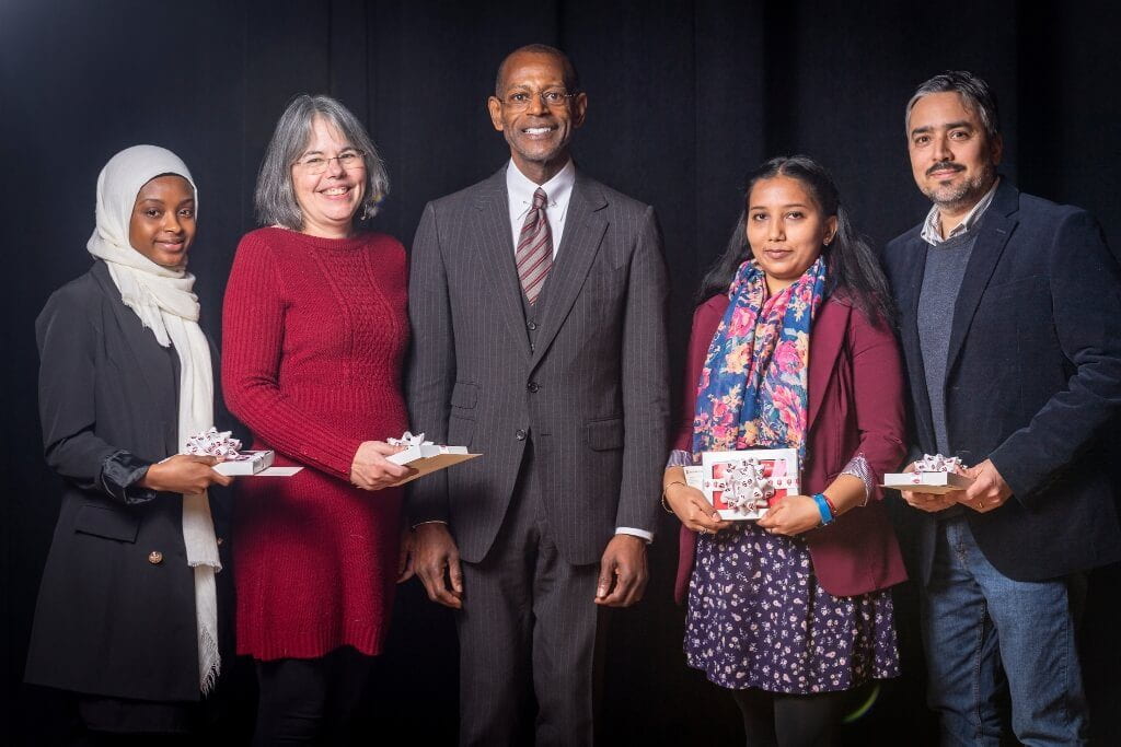 Winners of the 2019 Building Bridges Award pose with James C. Wimbush, vice president for diversity, equity and multicultural affairs. Pictured from left are Mariama Bah, Raquel Anderson, James Wimbush, Trishnee Bhurosy and Cristian Medina.