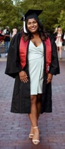 Neelam Patel in graduation cap and gown.
