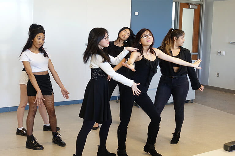 IU K-pop dance group (Unison) performing at the event.