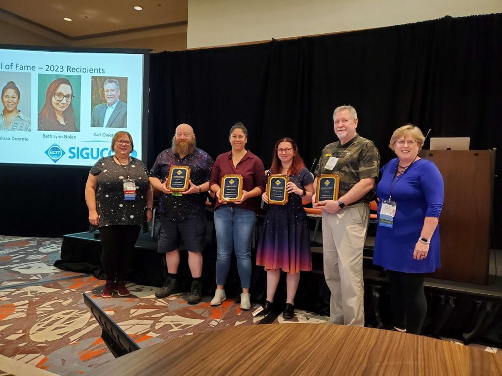 From left to right: Laurie Fox, past president of SIGUCCS executive board; Max Cohen, 2023 SIGUCCS Hall of Fame inductee; Melissa Doernte, 2023 SIGUCCS Hall of Fame inductee; Beth Lynn Nolen (me), 2023 SIGUCCS Hall of Fame inductee; Karl Owens, 2023 SIGUCCS Hall of Fame inductee; Lisa Brown, president of the SIGUCCS Executive Board