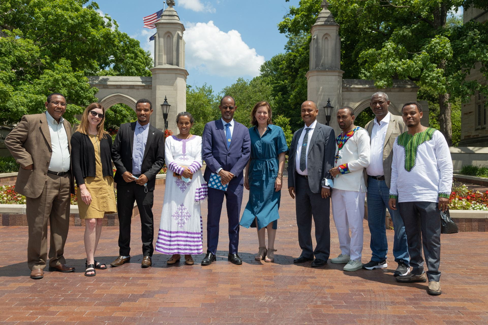 Indiana University and Ethiopian university leaders in front of the Sample Gates