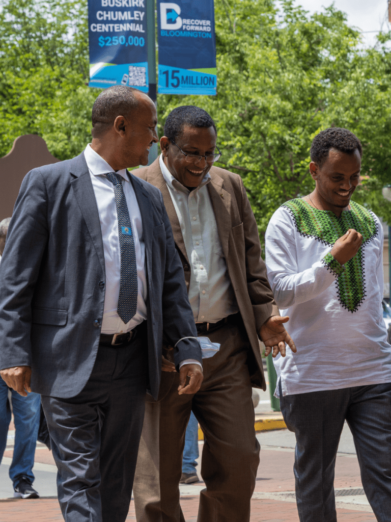 Teshome Alemneh and members of the delegation on Kirkwood Avenue.