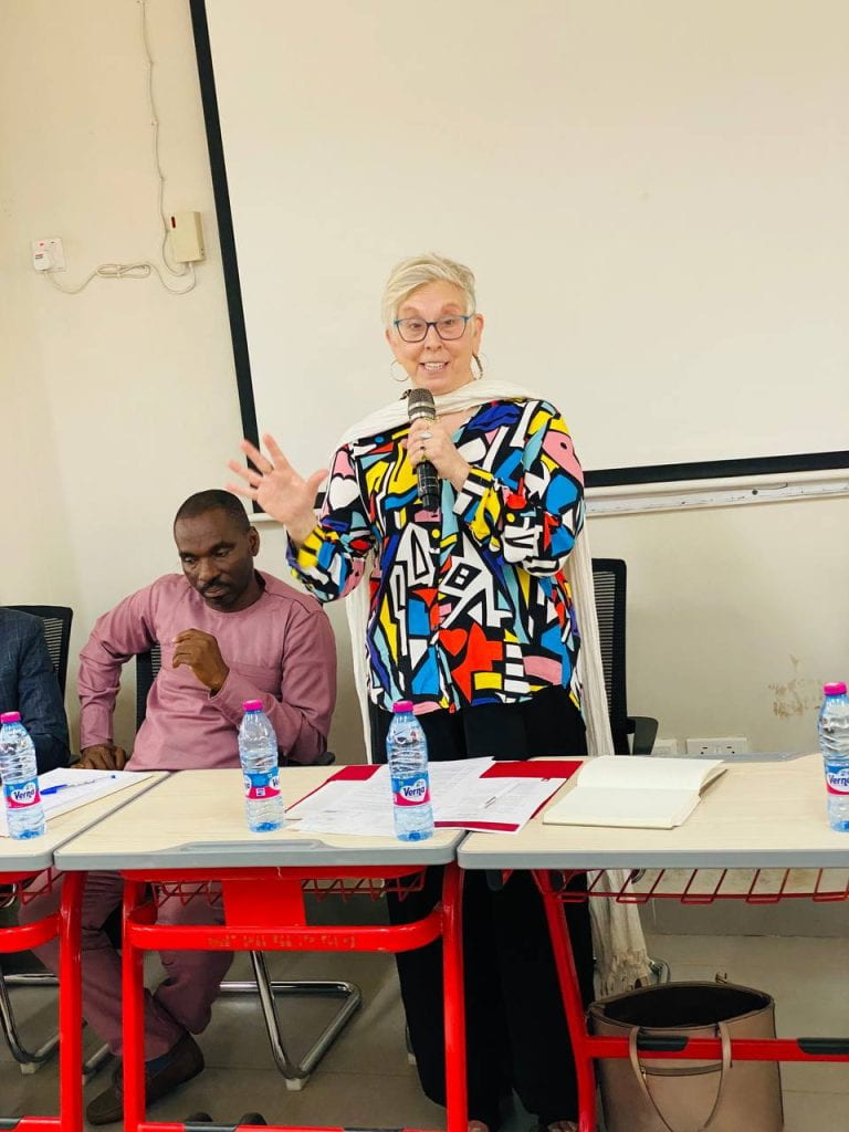 Hilary Kahn speaking to a group at KNUST's Political Science department.