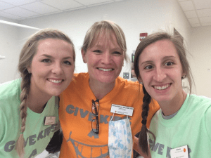 Dr. Carmen Dielman with two former students (Cayla Swihart and Brianna Hensley) at the Give Kids a Smile Day at IUSB.