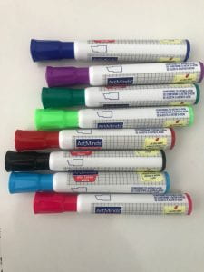 8 various whiteboard marker colors on desk