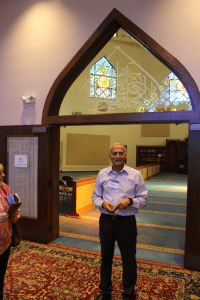 Dr. Abdul-Rahman Soliman leads a tour of the mosque and prayer area for visitors during the 2019 International Festival.