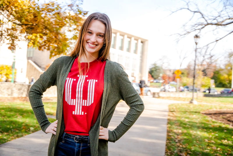 college age female student in red IU t-shirt
