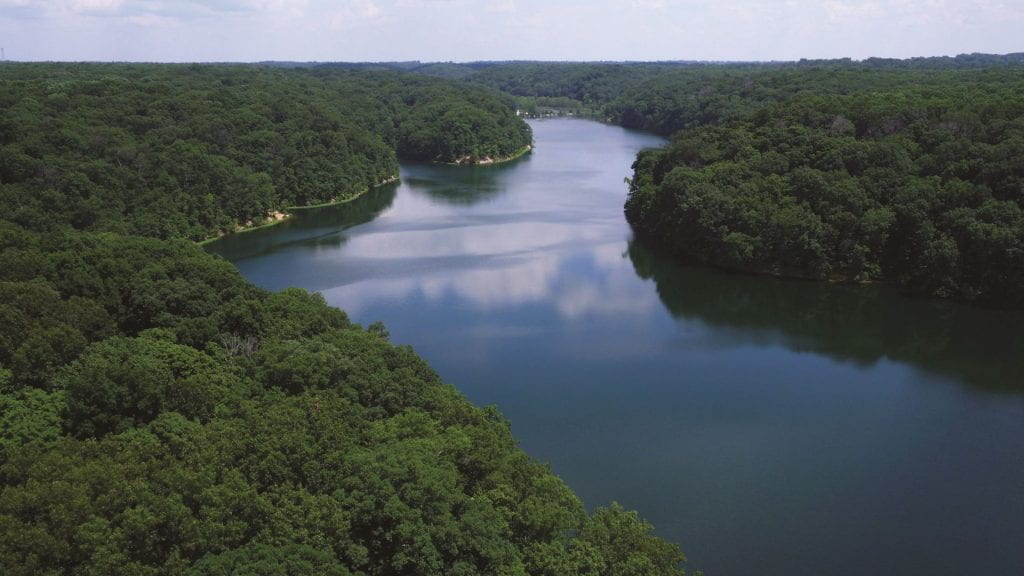 aerial view of Griffy Lake surrounded by trees