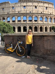 Danielle standing in front of the colosseum