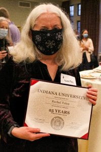 Rachel Tolen pictured with her certificate of recognition for 25 years of service to IU