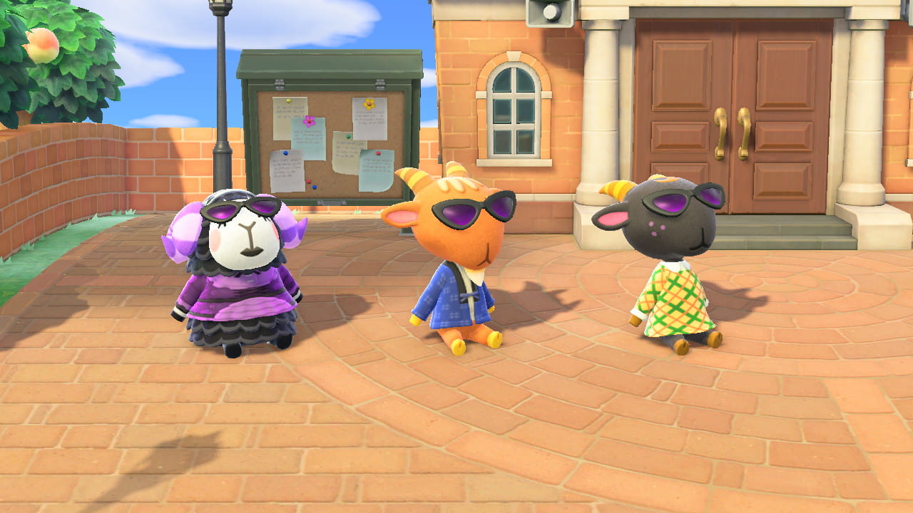 [image showing three animal crossing characters in the town square.]
