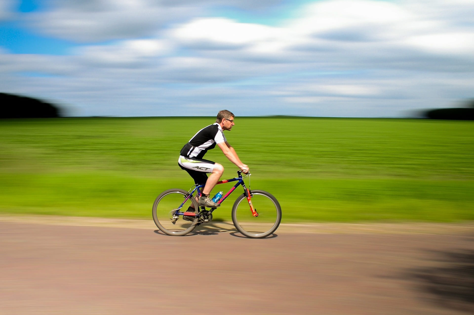Image of a cyclist riding their bike.