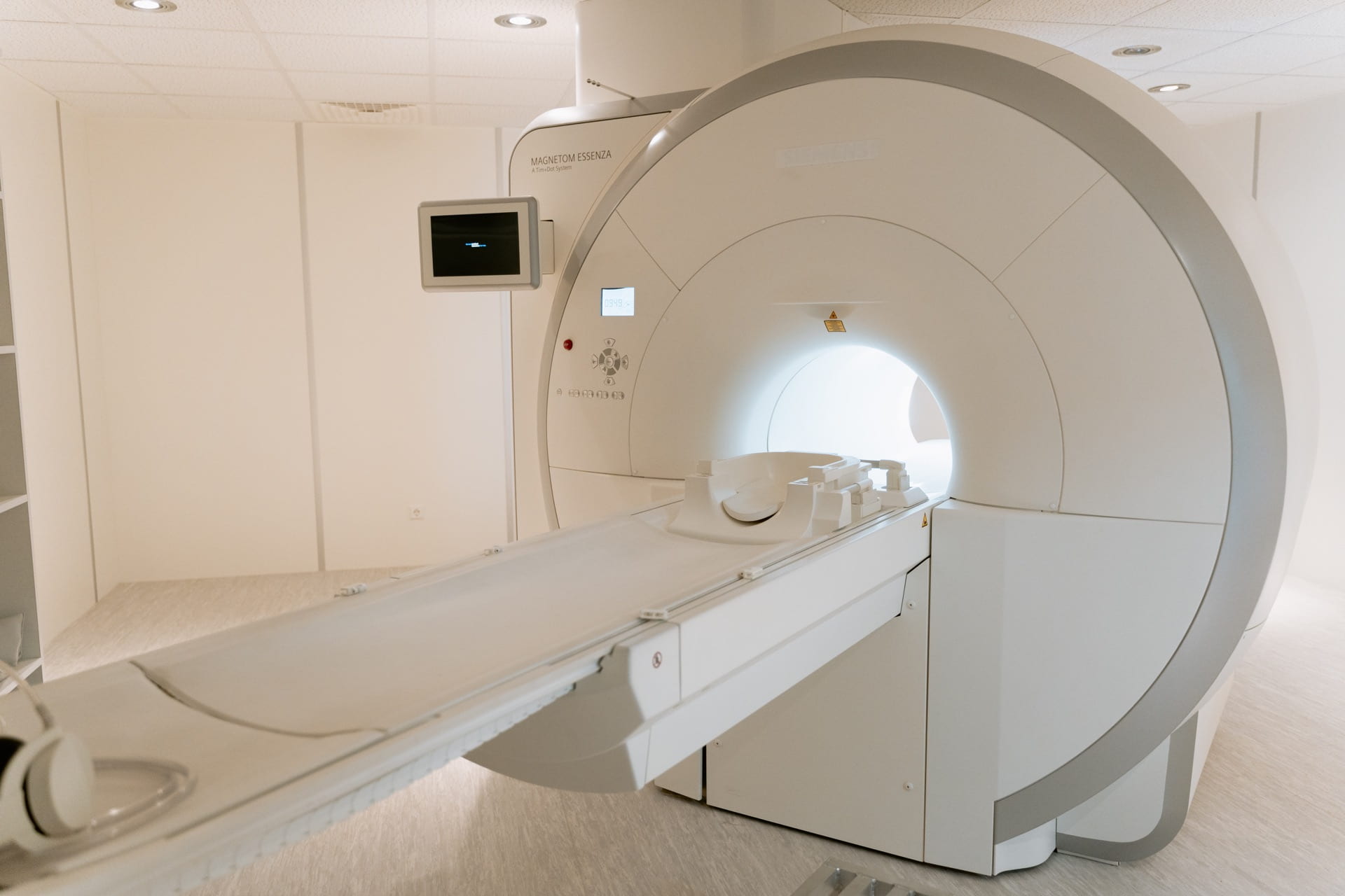 Image of a bed connected to an MRI machine.