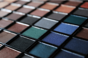 Close-up image of a multi-colored eyeshadow palette