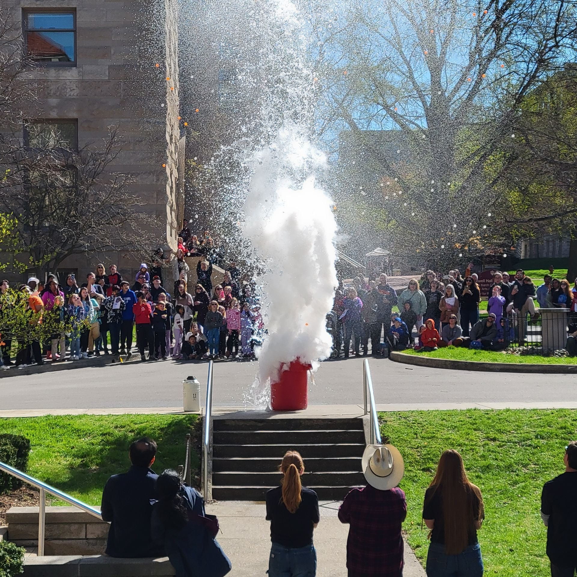 Image of a large red bin serving as a makeshift volcano for an engaging science experiment